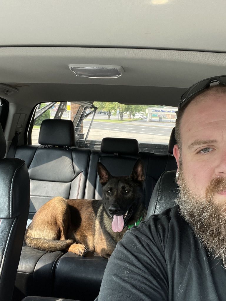 Brian Ferguson with his malinois